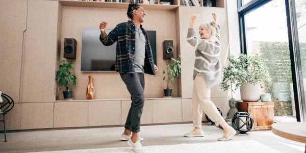 People dancing in living room