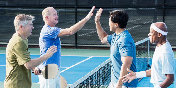 Men playing pickleball
